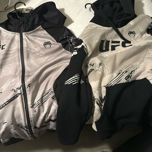 Two official Ufc sweaters ! One zip up sweater and one pull over hoodie!